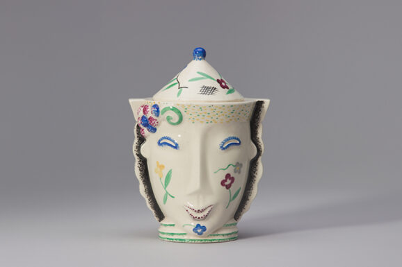 Covered Jar In The Form Of A Face